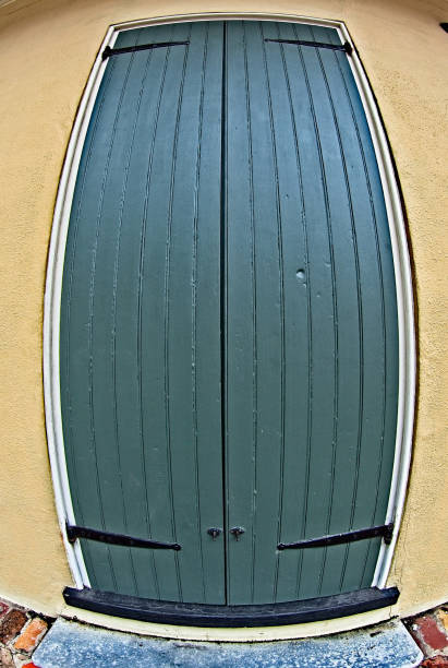 istock Green Shutter Doors & Yellow Wall in the French Quarter 839921426
