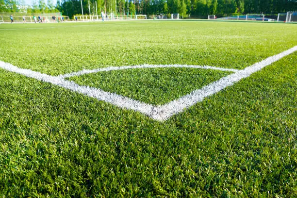 corner kick football/soccer field outline on green artificial grass