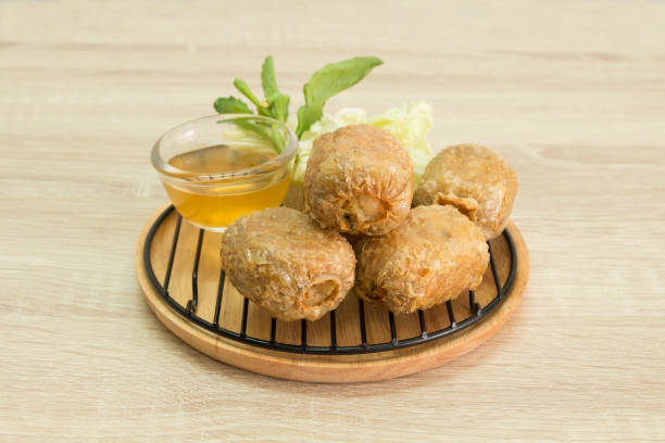 istock FRIED CRAB DUMPLING ON GRILL AND WOOD PLATE 839921852
