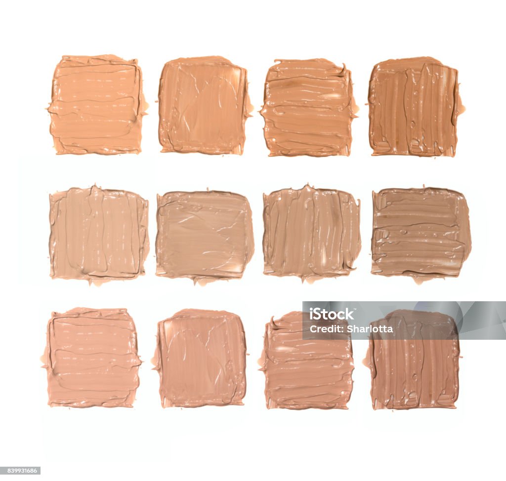 Three rows of four samples of neutral, cold and warm shades of foundation on a white background Three rows of four samples of neutral, cold and warm shades of foundation on white background Adult Stock Photo