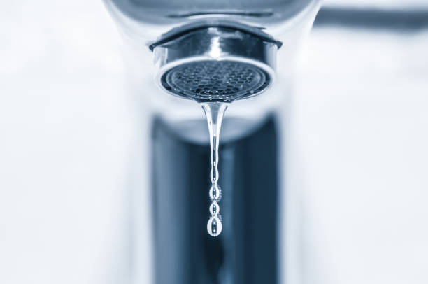 istock Tap with water drops close up 839935760
