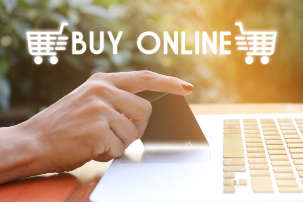 istock Women is shopping online with laptop 839938520