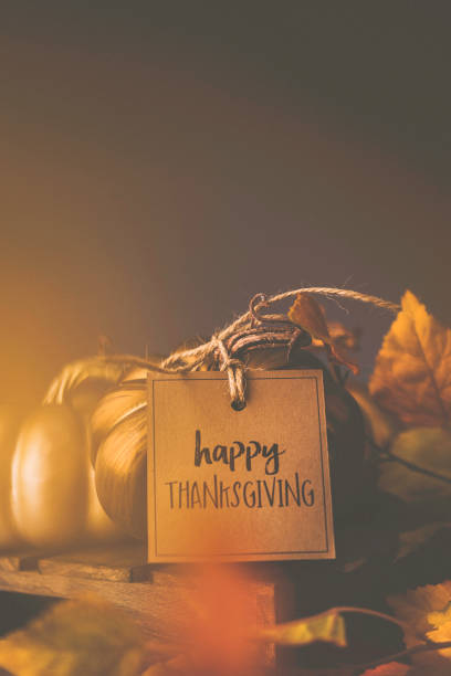 istock Thanksgiving still life background with pumpkins and message 839938826