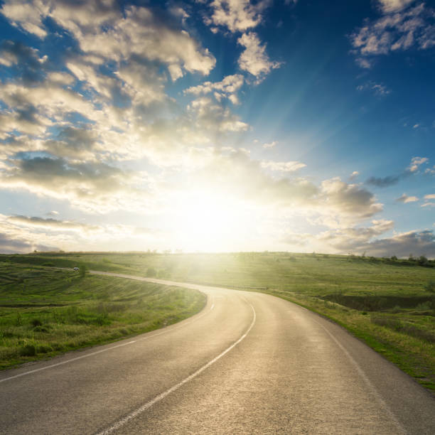 istock sunset in clouds over asphalt road to horizon 839941586