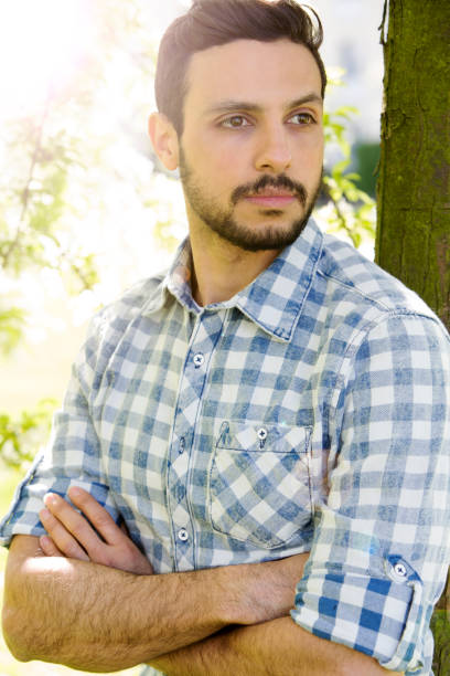 istock portrait of handsome young dark-haired man 839941860