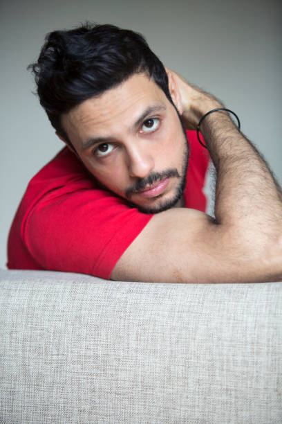 istock portrait of handsome young dark-haired man 839944910
