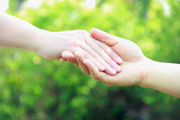 istock Man and woman hand on nature background 839947938