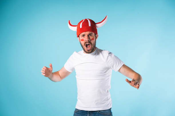 istock The football fan over blue 839956062
