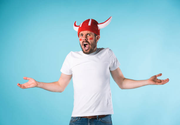 istock The football fan over blue 839956120