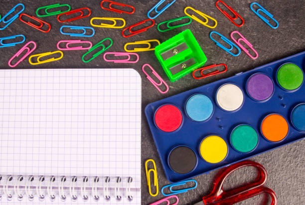 istock School supplies on black background ready for your design. 839958418