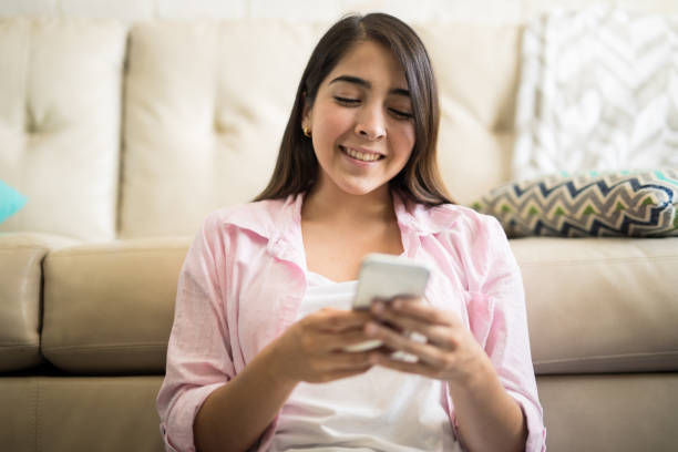 istock Gorgeous woman relaxing with her phone 839961808