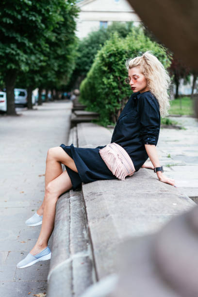 istock Blonde woman with a bag 839969668
