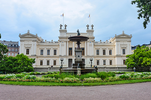 Palace and park ensemble of Gatchina Park: Karpin Pond, Gatchina Palace, private palace garden on a sunny summer day, Gatchina, St. Petersburg, Russia