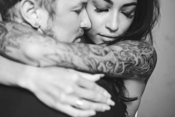 istock Beautiful, young couple posing on camera indoors 839975878