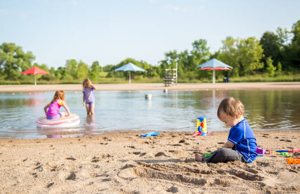 istock Toddler Boy & Sisters at Beach on Summer Day 839976268