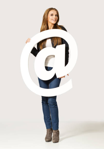 istock Young woman with @ letter 839977300