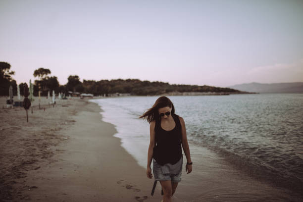 istock Woman at the beach 839986642