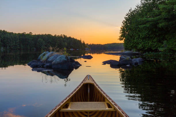 istock Bow of a cedar canoe at sunset - Haliburton, Ontario, Canada 839989308