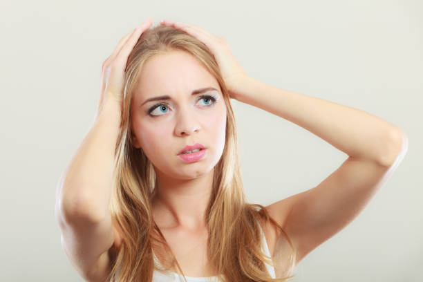 istock woman suffering from head pain 839989756