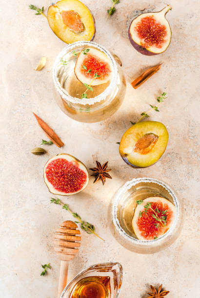 istock White cocktail with fig, plum, honey and thyme 839996972