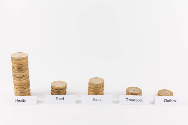 istock Big expenses on health. Coin stacks isolated 840009058