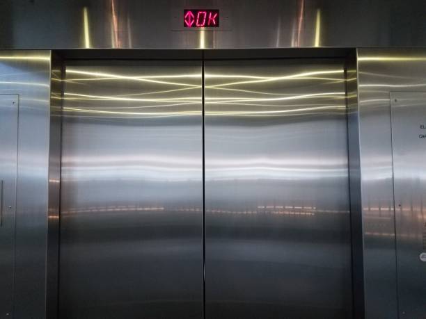 istock inside an elevator with shiny metal doors 840012138