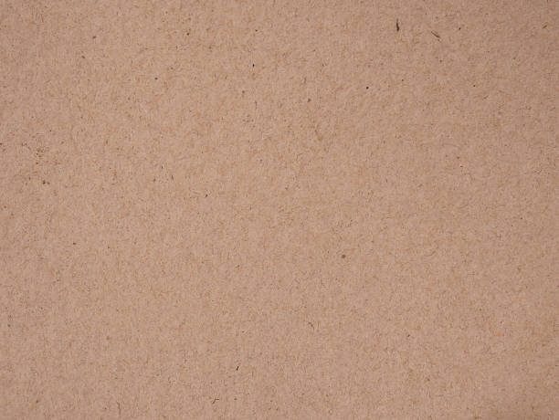 istock Brown recycled old paper texture or brown craft carton old rough plain light cardboard background 840028202