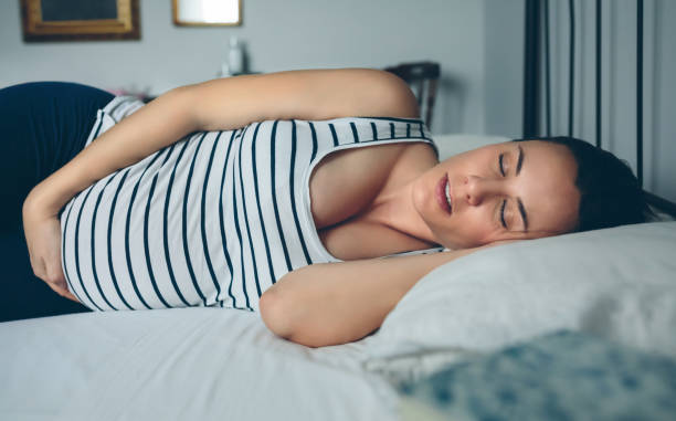 istock Pregnant woman sleeping in bed 840031520