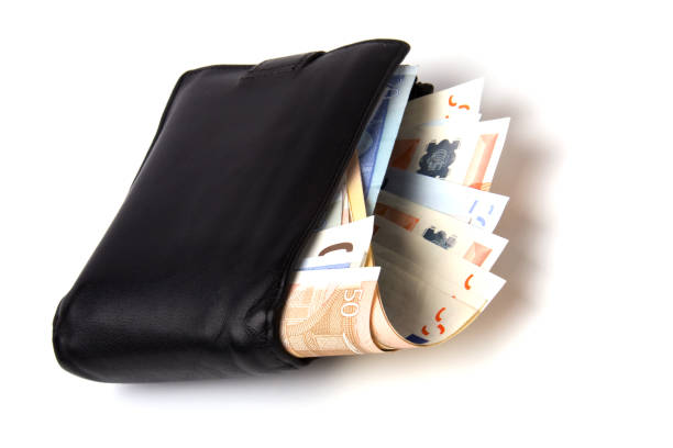 istock Money in leather  purse isolated on white  background 840031616