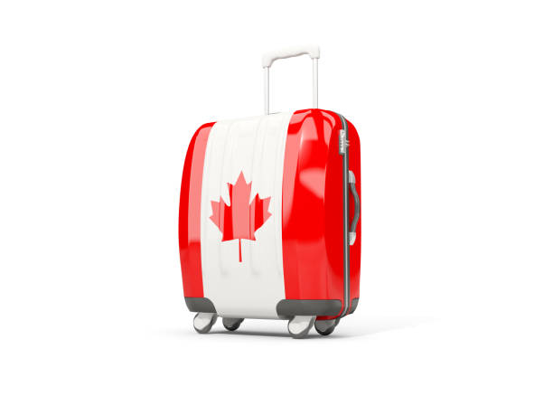 istock Luggage with flag of canada. Suitcase isolated on white 840034598