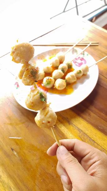 istock Grilled pork ball with skewer with spicy sauce 840037498