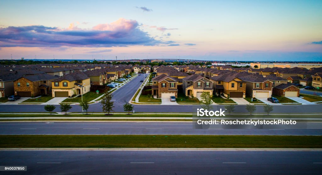 Sunset Suburbia Aerial drone shot above Austin , Texas Suburb new home envelopment Suburb Stock Photo