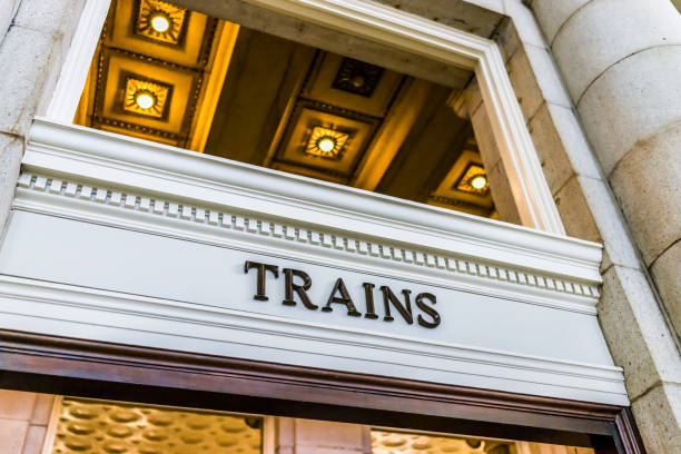 istock Transportation train sign inside building with golden lights 840041076
