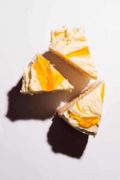 istock Three pieces of cake against white from above. 840044872