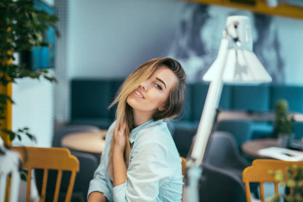 istock Beautiful girl in fast food restaurant 840057066