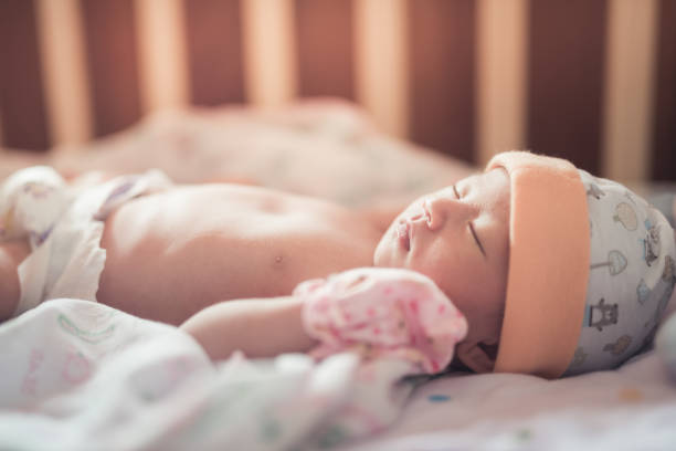 istock portrait asia baby on the bed 840065028