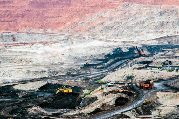 istock Part of a pit with big mining truck working 840082206