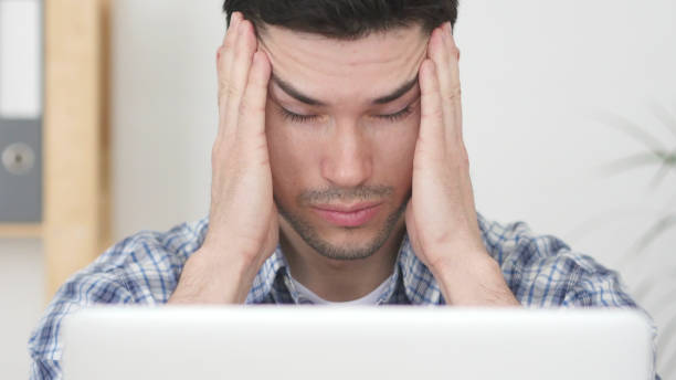 istock Headache, Man Working on Laptop with Head Pain, Close Up 840085408