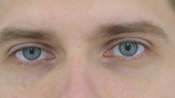 istock Blinking Eyes of Young Man, Close Up 840085418
