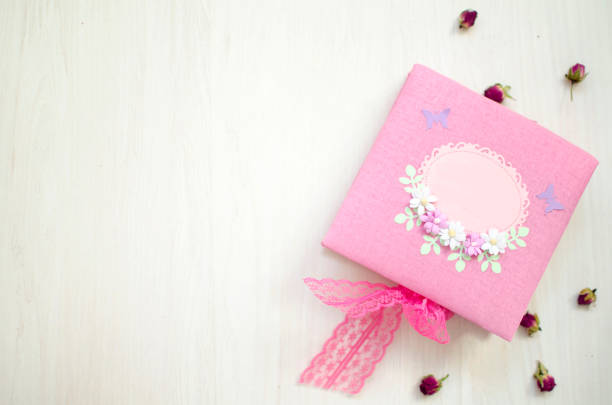 istock Nice colorful gift box on the white wooden background. 840085882