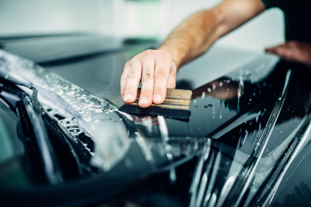 istock Auto paint protection, transparent film closeup 840088894