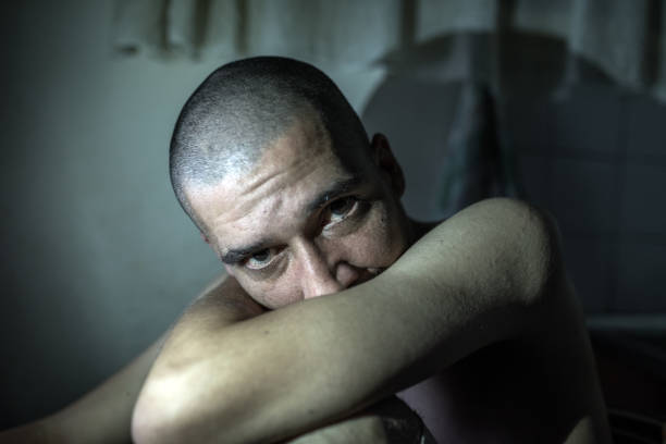 istock The sick man is depressed. Make him like in the world alone. No solution and solution to the problem. 840095958
