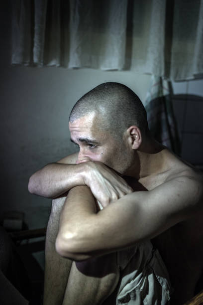 istock The sick man is depressed. Make him like in the world alone. No solution and solution to the problem. 840096014