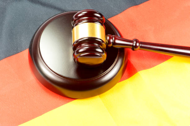 istock A judge's hammer and the German flag 840098958