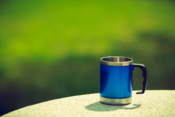 istock Tourist cup mug outside standing on rock 840103676
