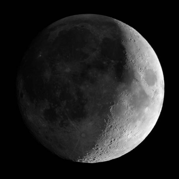 istock Waxing crescent moon seen with telescope 840106370