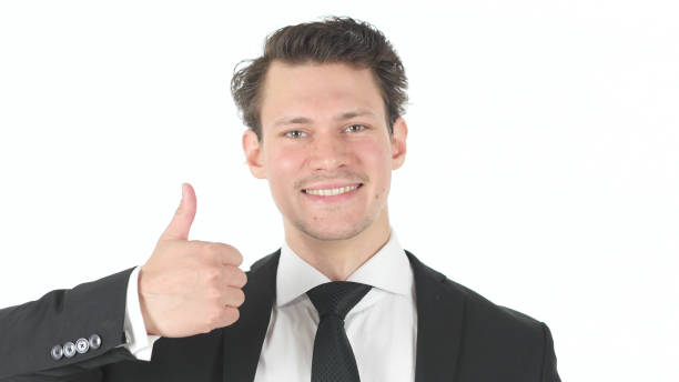 istock Thumbs Up by Young Businessman on White Background 840106862
