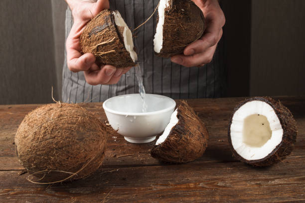 istock Coconut water pouring into white bowl 840109572