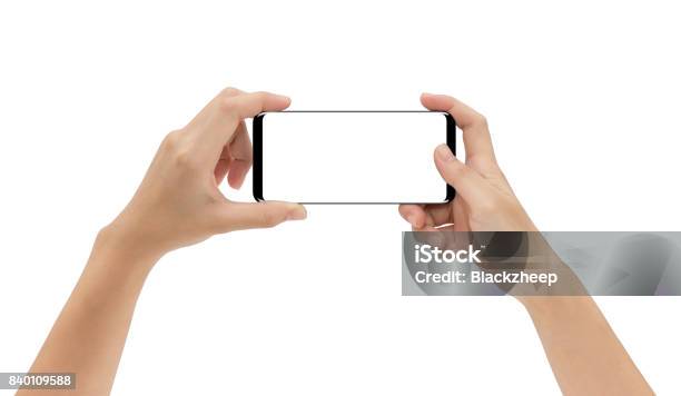 ホワイト バック グラウンド クリッピングパスの内側に分離を持っている手でモックアップ電話 - 横位置のストックフォトや画像を多数ご用意 - 横位置, 人間の手, 手