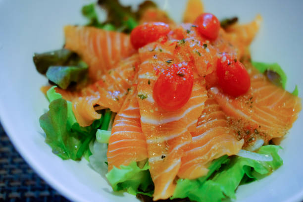 istock Delicious smoked salmon salad on white dish 840109600